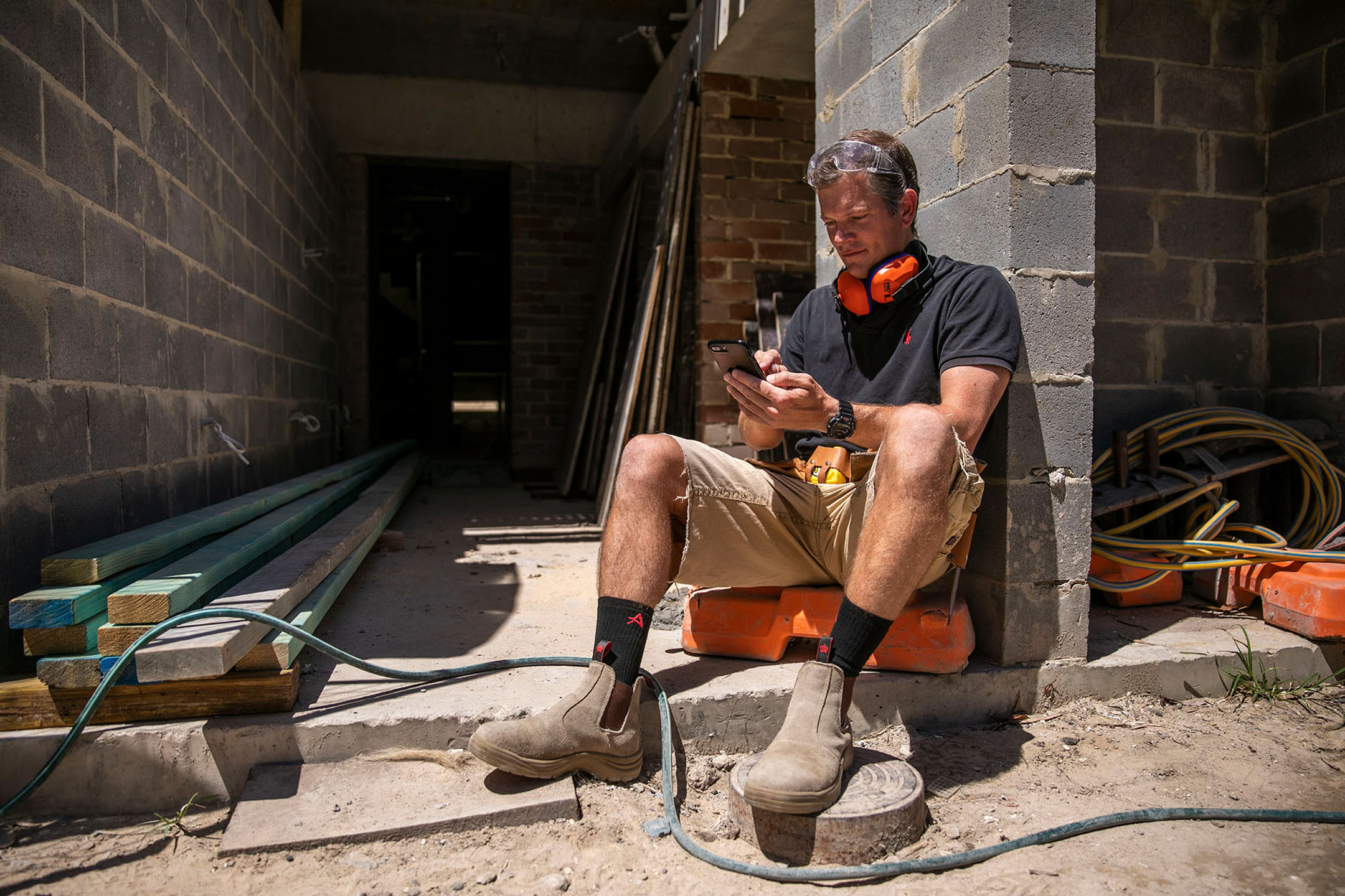 Man on phone at work site